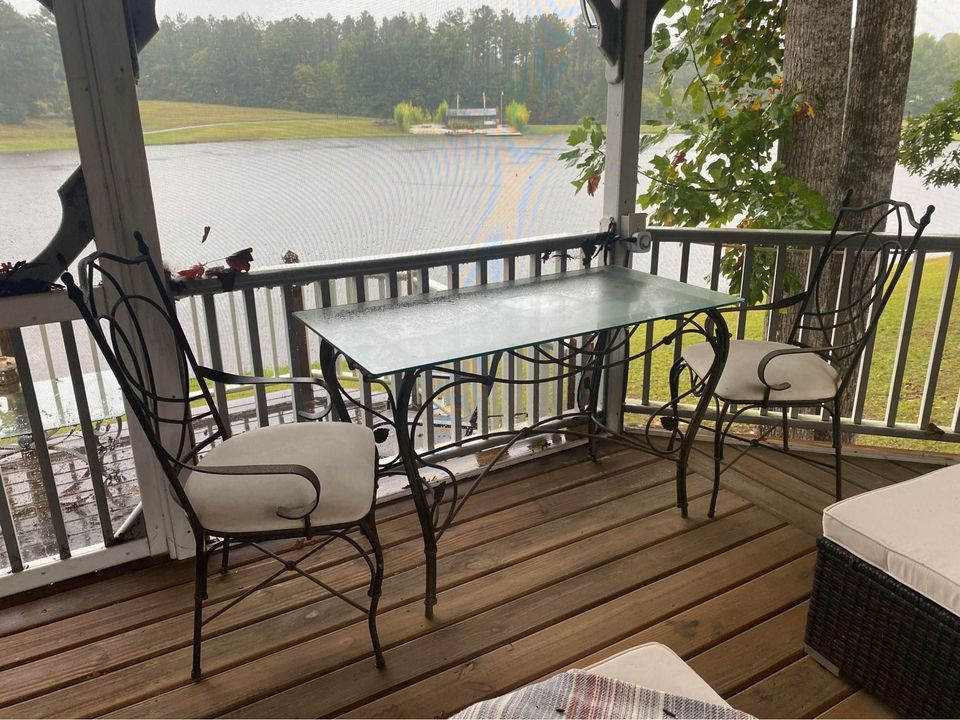 Black Iron Glasstop Table and Two Chairs