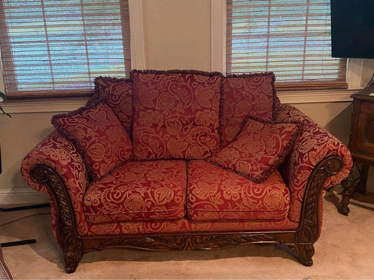 Red and Gold Loveseat with Rolled Arms and Wood Front